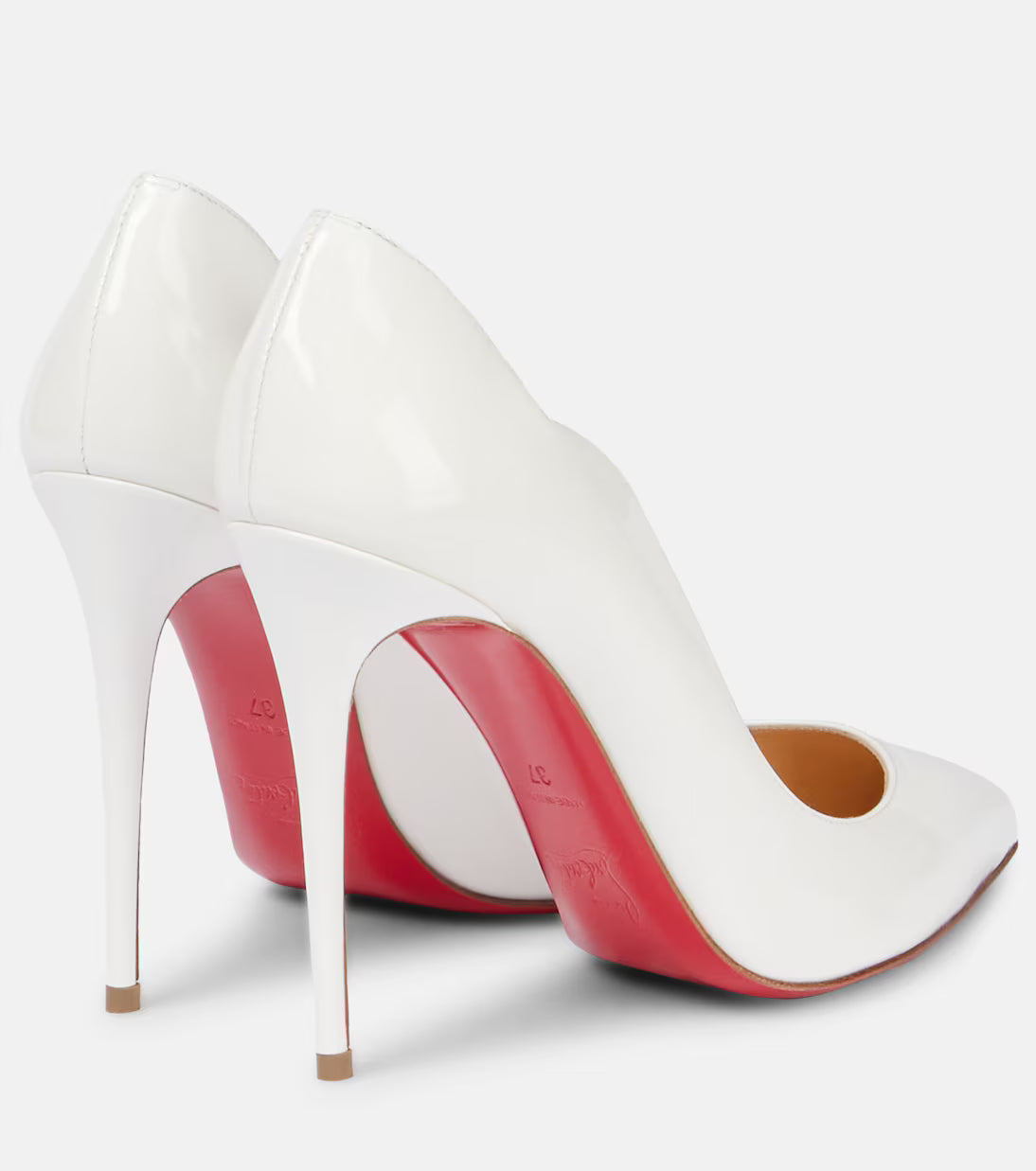 The Signature Stride: Obsidian Pumps with Crimson Soles