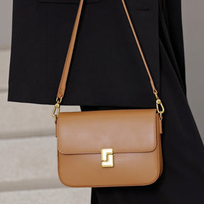 Mala a tiracolo preta com fecho de corrente dourada - Bolsa de ombro versátil para mulheres, design minimalista, fecho de correr, disponível em tamanhos S a XXL