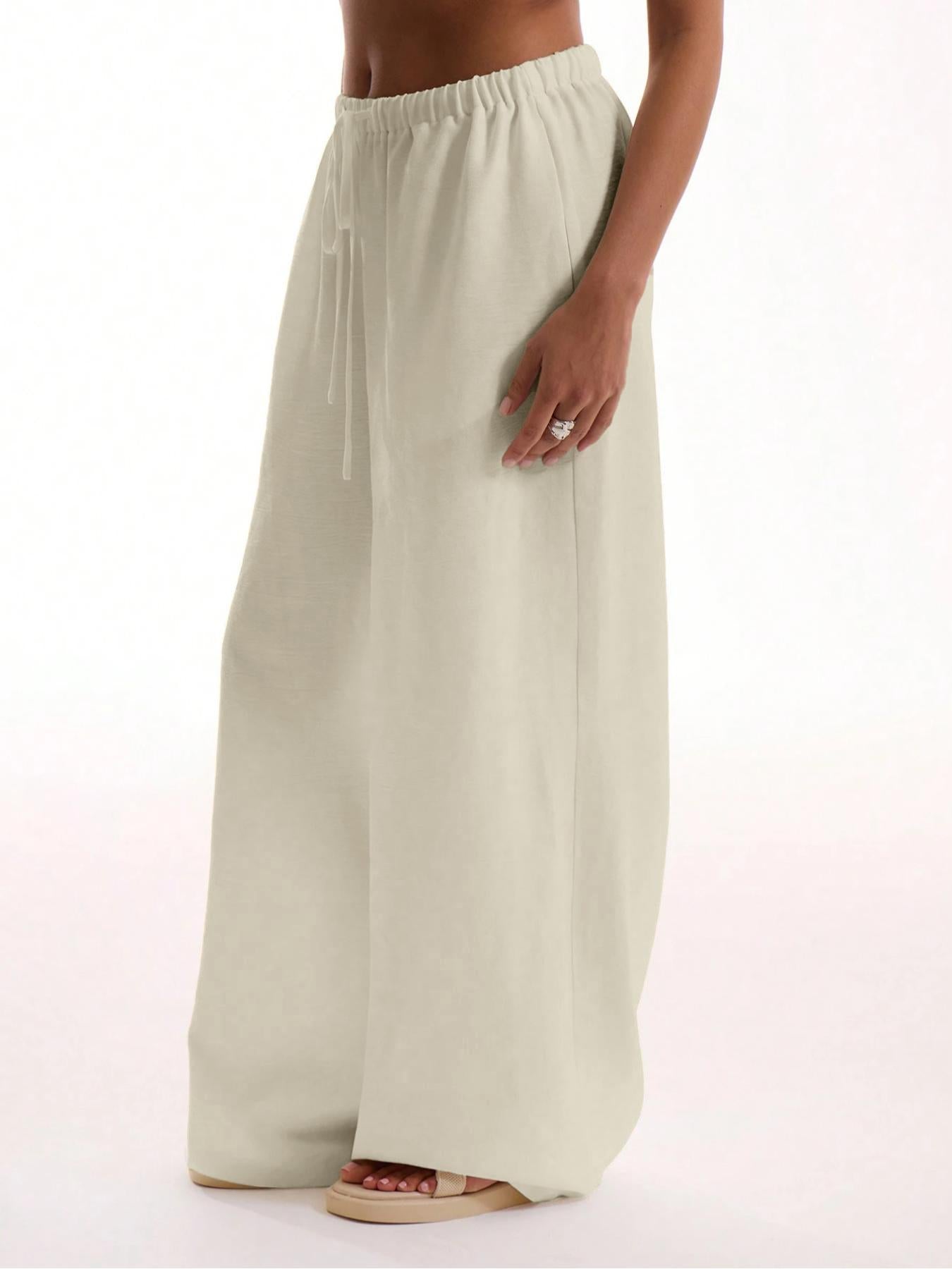 The Essence of Summer Ease: The Sculpted Wide-Leg Trouser