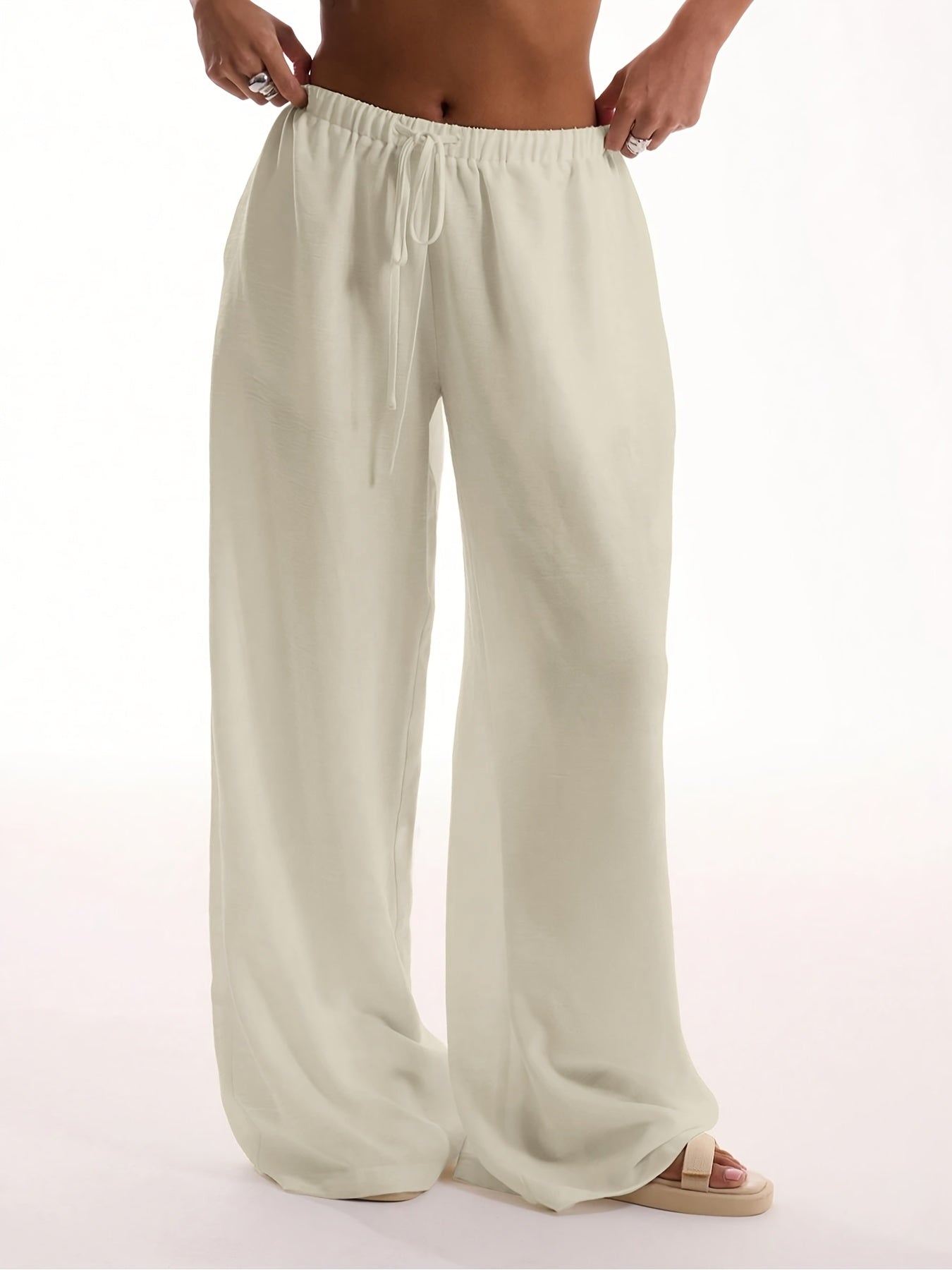 The Essence of Summer Ease: The Sculpted Wide-Leg Trouser