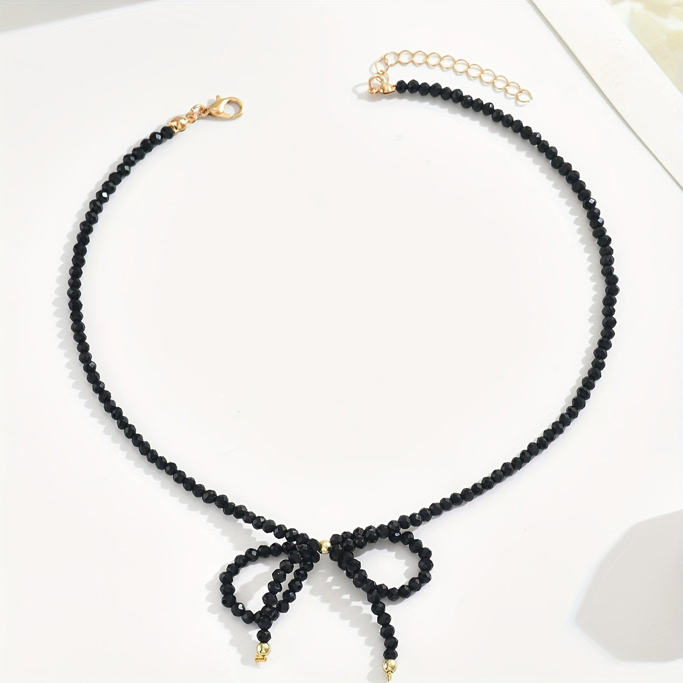 Colar Choker Charmoso com Laço e Miçangas, Ajustável em Tamanho e Contagem de Beads Variável