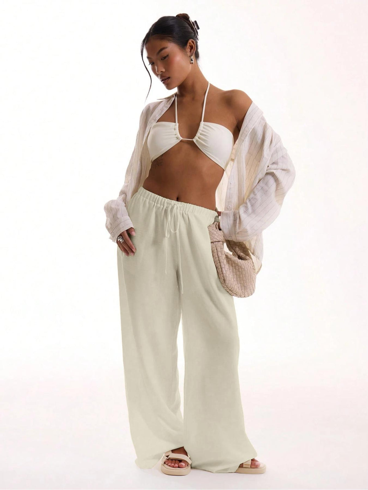 The Essence of Summer Ease: The Sculpted Wide-Leg Trouser