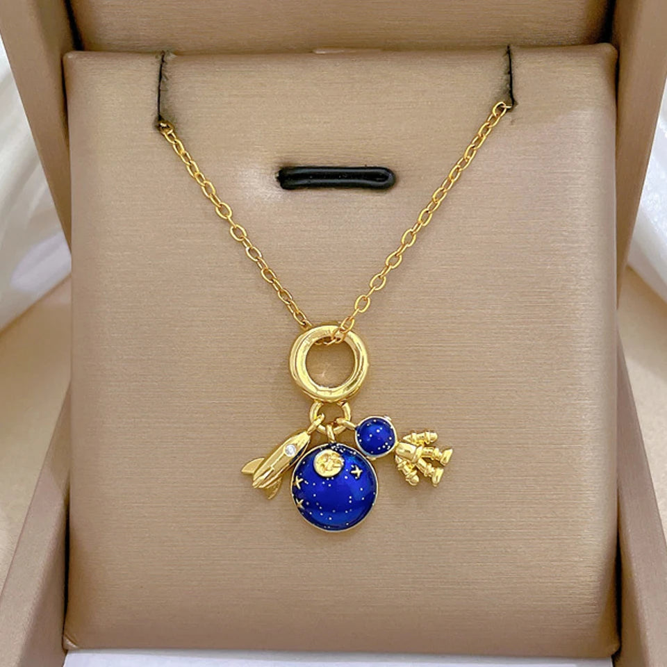 Celestial Elegance: Gold Planet & Moon Necklace