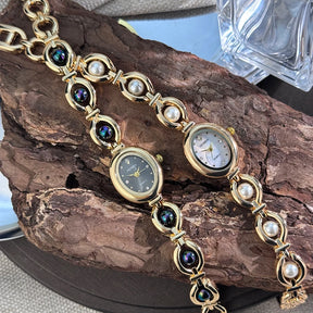 Ladies' silky texture Oval alloy case set with movable fine bead bracelet Sun Print rhinestone dial Elegant Lady quartz watch