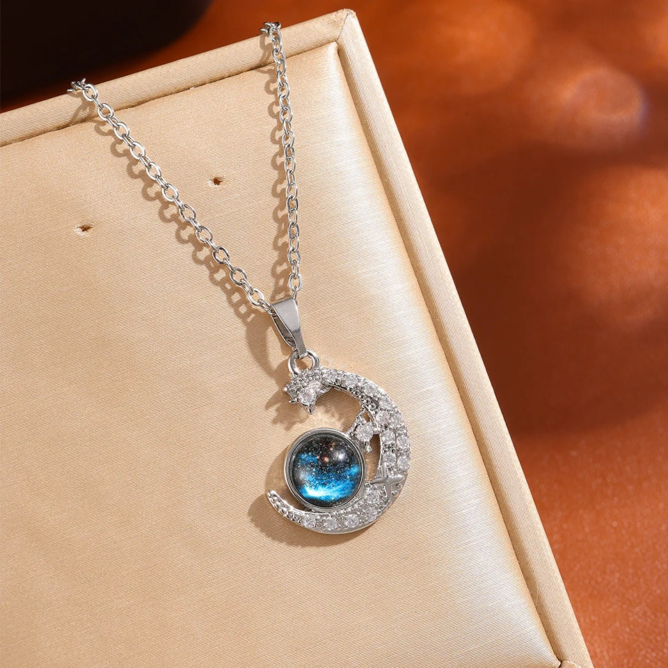 Celestial Elegance: Gold Planet & Moon Necklace