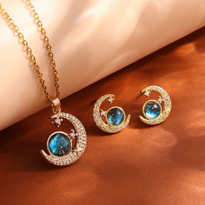 Celestial Elegance: Gold Planet & Moon Necklace