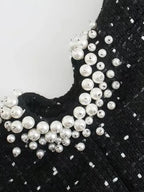 The Pearl Noir: Vintage-Inspired Hollow-Out Mini Dress