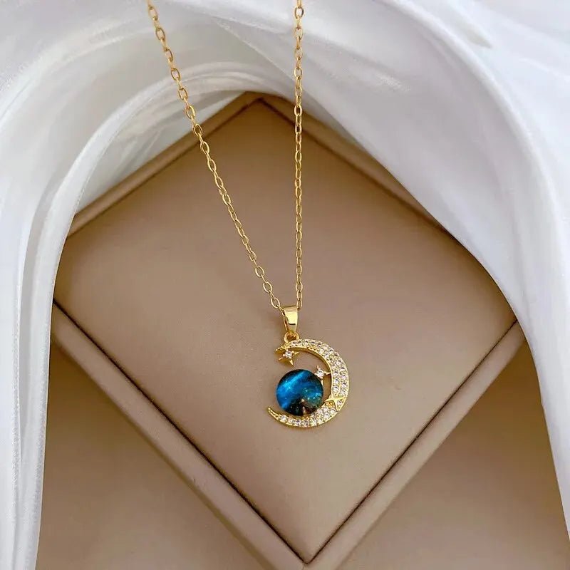 Celestial Elegance: Gold Planet & Moon Necklace