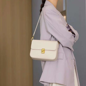 Mala a tiracolo preta com fecho de corrente dourada - Bolsa de ombro versátil para mulheres, design minimalista, fecho de correr, disponível em tamanhos S a XXL