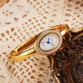 Novo Relógio Feminino, Dourado Rosé, Design de Luxo Leve e Exclusivo, Pulseira Oval com Numerais Romanos