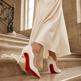 The Signature Stride: Obsidian Pumps with Crimson Soles