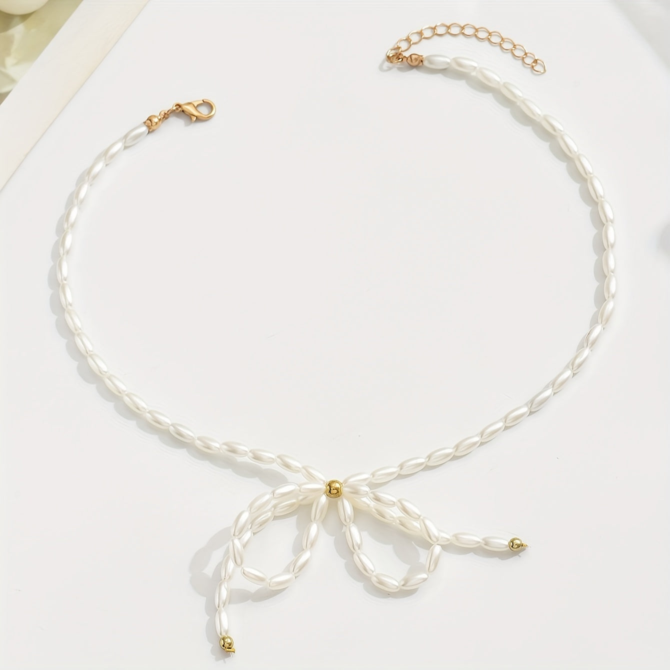 Colar Encantador com Laço de Design Único, Corrente Artesanal Cortada ao Tamanho com Número Ajustável de Contas