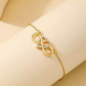 Bracelete Feminina Elegante com Pingente de Coração - Corrente Delicada com Detalhes em Strass, Presente para Dia dos Namorados, Aniversário ou Festa - Acessório Luxuoso e Charmoso para o Dia a Dia, Joia em Liga de Cobre